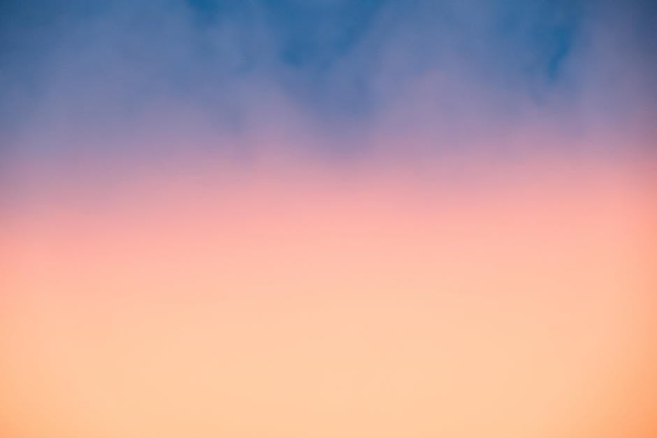 Abstract gradient capturing the serene transition of colors at dusk over Oslo's skyline.